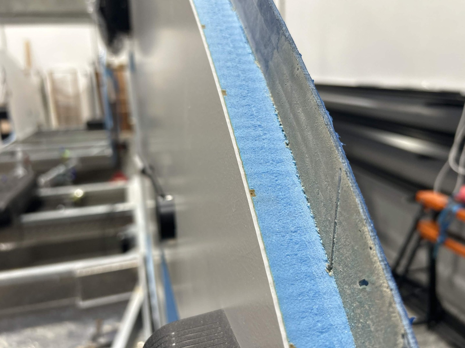 Close-up of JAG Camper's 30mm FRP/XPS/FRP insulated XPS composite panel showing the foam core.