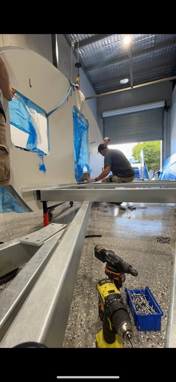 JAG Camper body being assembled in the workshop using insulated composite panels on a metal chassis.