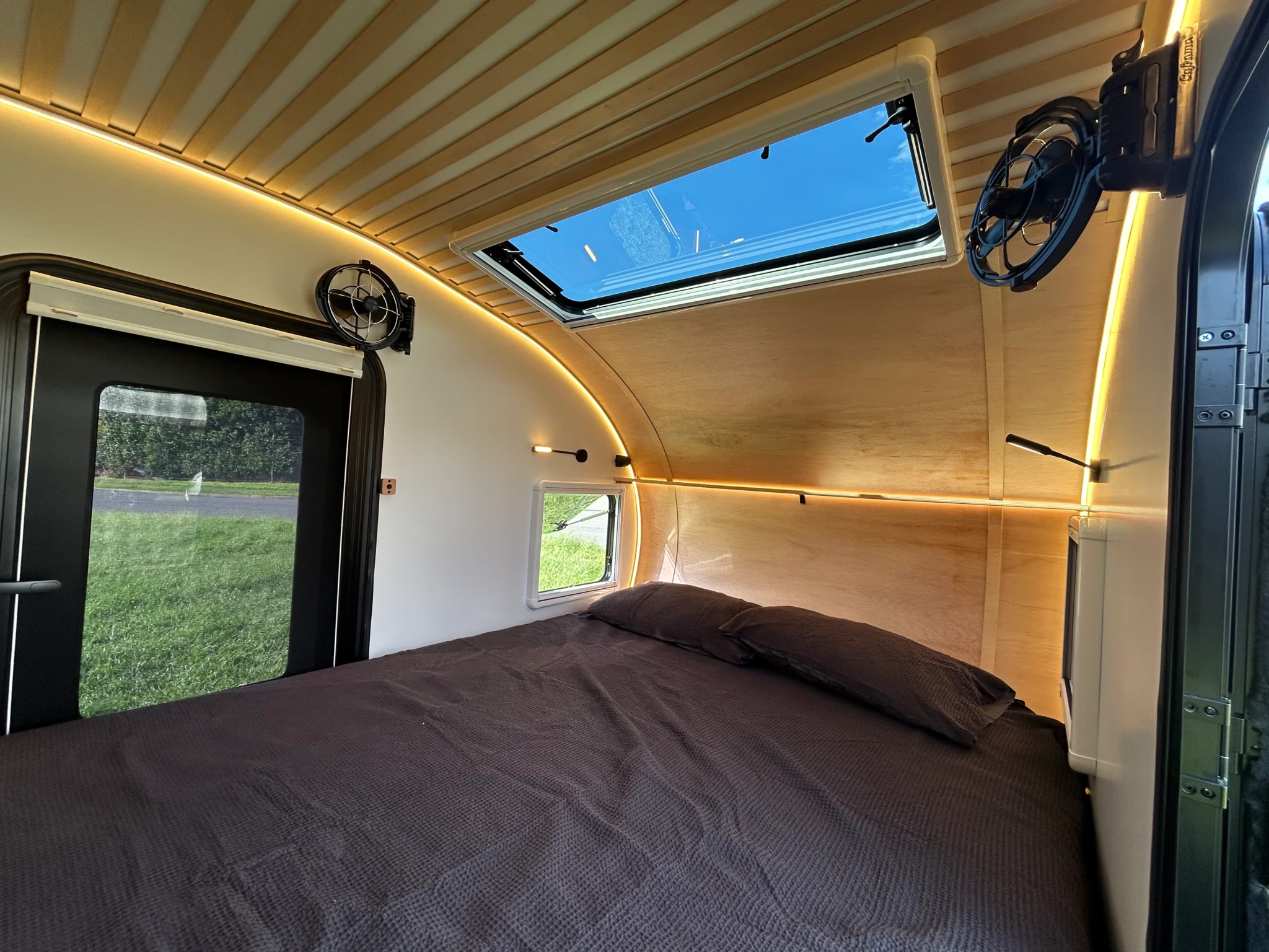 Queen bed inside the JAG Teardrop Camper cabin